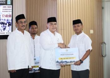 Kementerian ATR/BPN Salurkan Bantuan untuk Pegawai Terdampak Bencana di Aceh